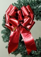 Bow Recipe – Red Wreath Bow Mirror Mirror Ribbon – 8 ½ yards Pro Bow Deluxe Center Finger – Row D – 1 wrap Finger 2 – Row G – Right &amp; Left -1 wrap Finger 3 – Row G – Right &amp; Left -1 wrap Finger 4 – Row G – Right &amp; Left -1 wrap Finger 5 – Row G – Right &amp; Left -1 wrap Finger 6 – Row H – Right &amp; Left -1 wrap
Video - How to Make This Bow