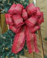 Bow Recipe – Red Wreath Bow Multi Weave Ribbon – 8 ½ yards Pro Bow Deluxe Center Finger – Row D – 1 wrap Finger 1 - Row G - Right &amp; Left - 1 wrap Finger 2 – Row G – Right &amp; Left -1 wrap Finger 3 – Row G – Right &amp; Left -1 wrap Finger 4 – Row G – Right &amp; Left -1 wrap Finger 5 – Row G – Right &amp; Left -1 wrap Finger 6 – Row H – Right &amp; Left -1 wrap